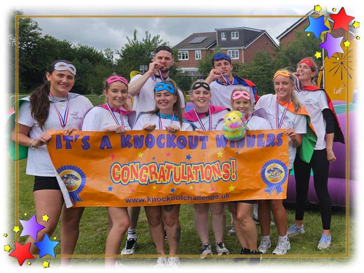It's A Knockout Winners With Banner
